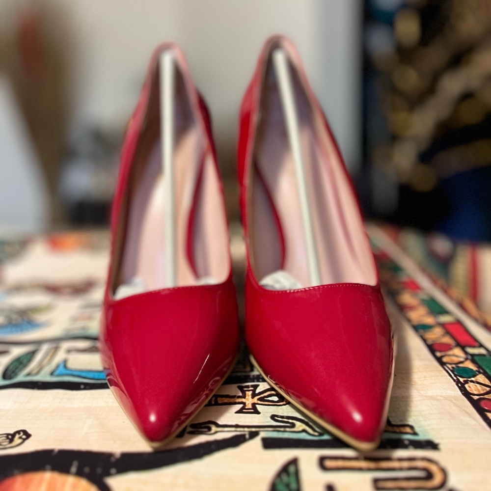 Red heels . Every Gal needs a pair !